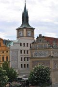 A large building with a clock tower on top of it.