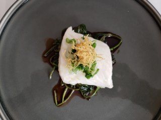 A close up of a plate of food on a table