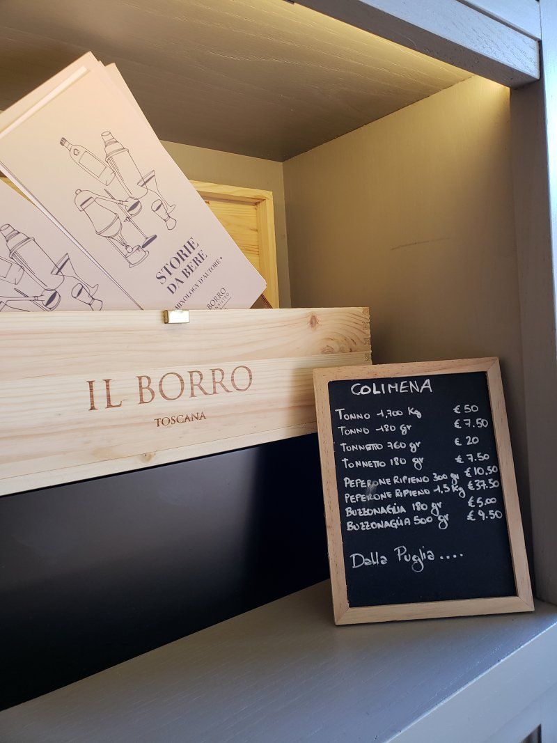 A wooden box with il borro written on it