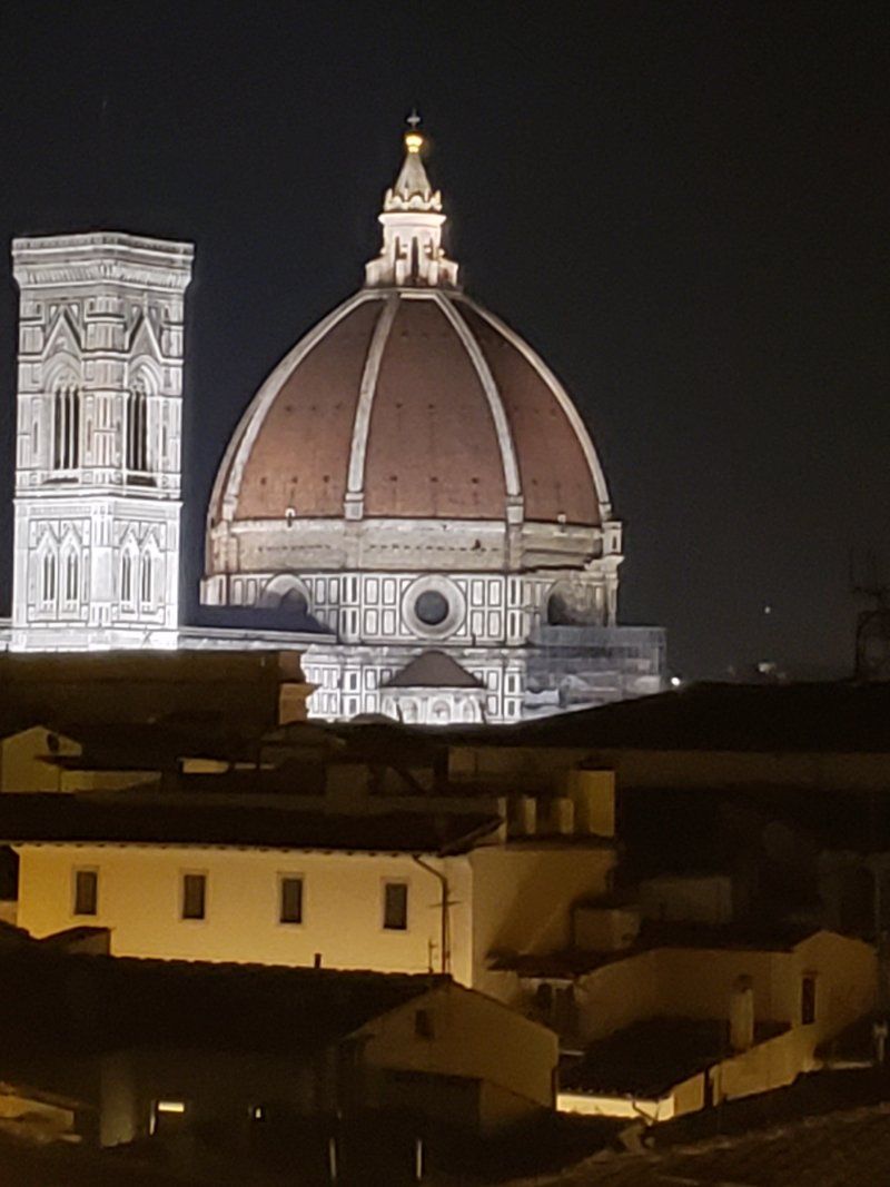 The dome of the cathedral is lit up at night
