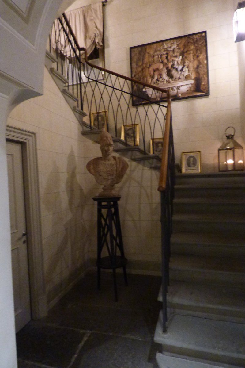 A staircase with a statue in the middle of it