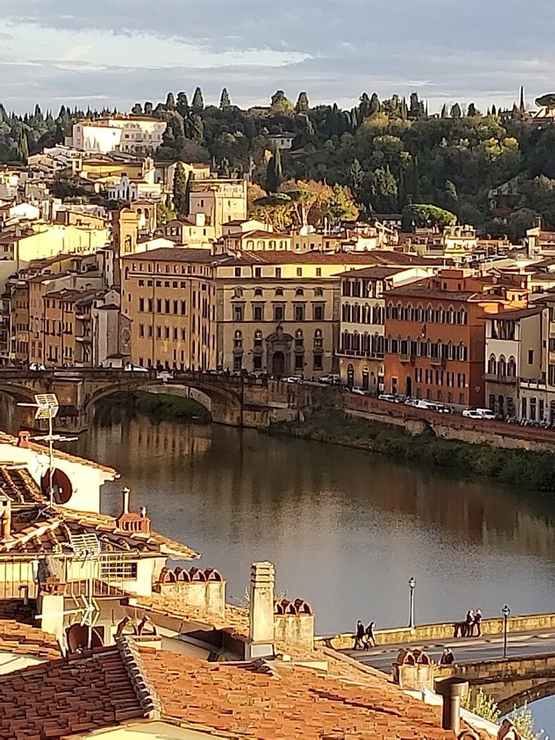 An aerial view of a city with a river running through it.
