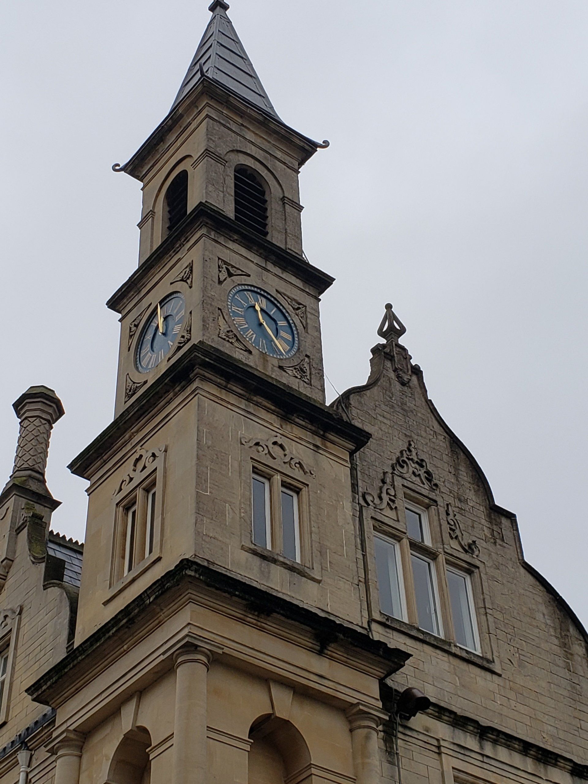 A large building with a clock tower on top of it