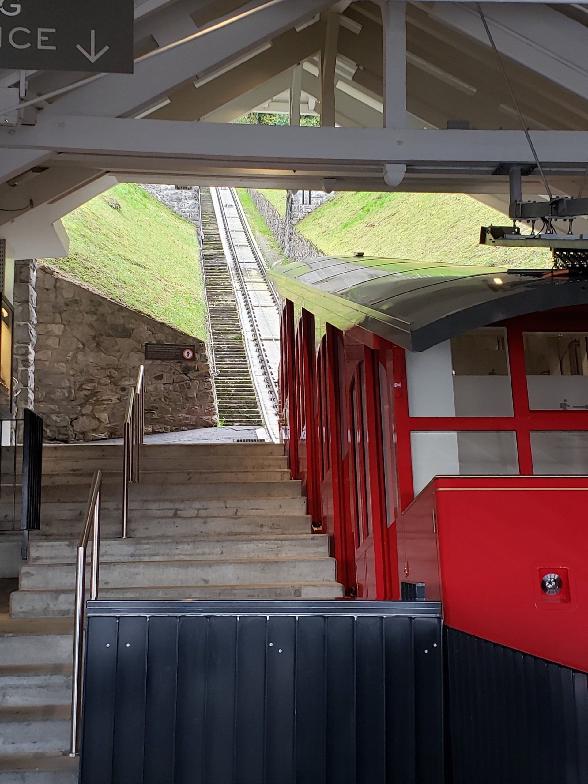 Stairs leading up to a sign that says service