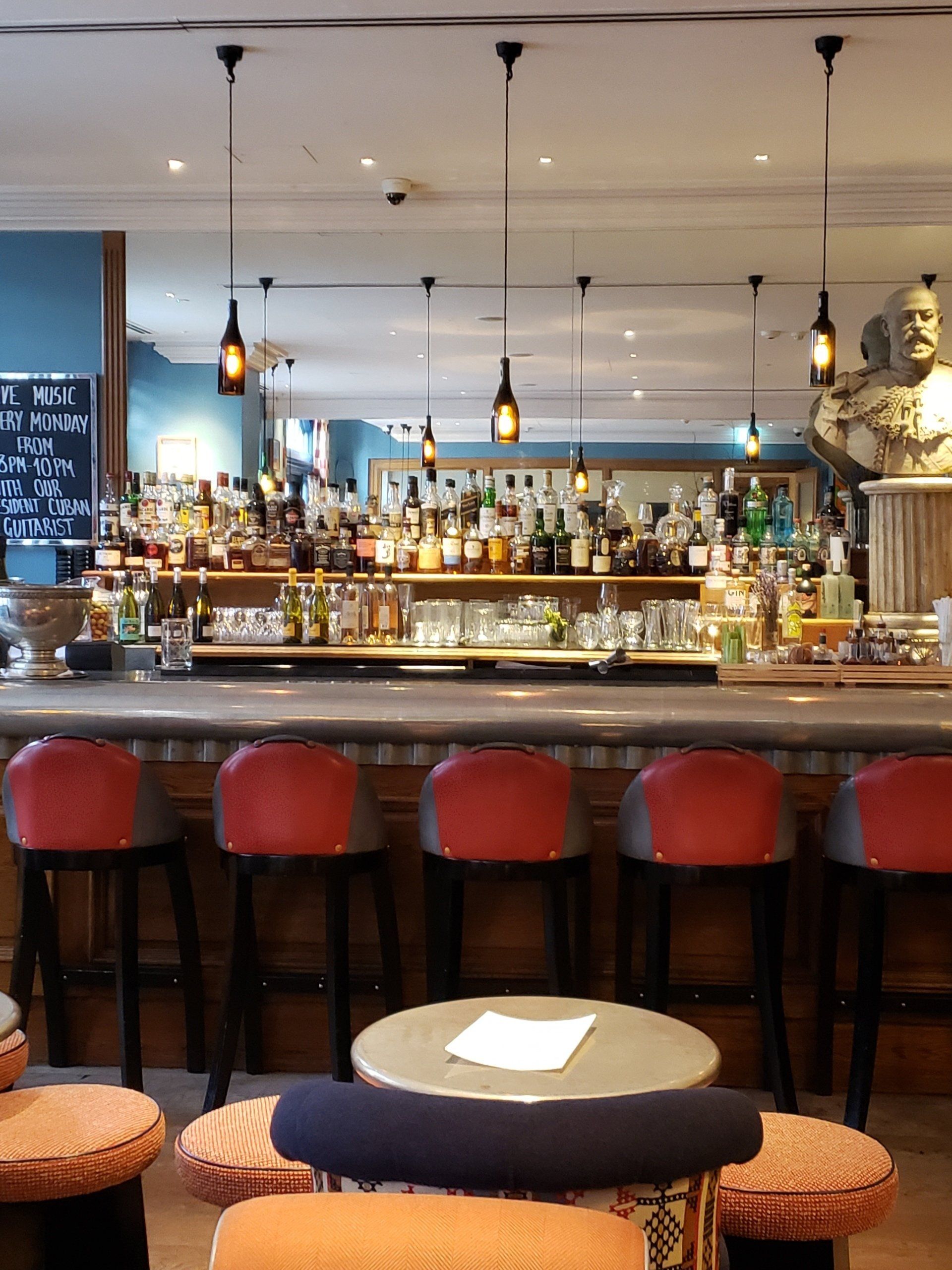 A bar with a lot of bottles on it