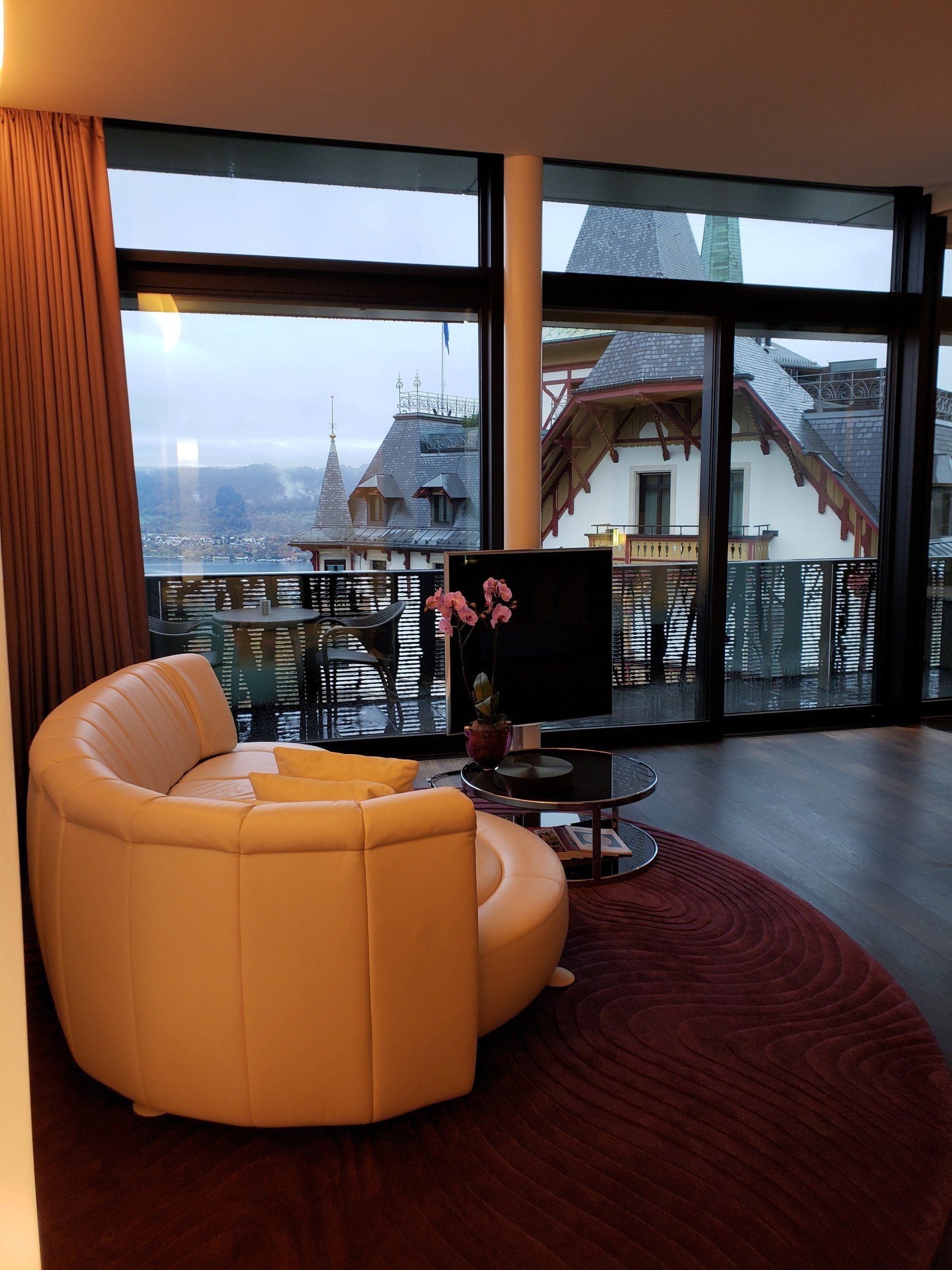 A living room with a couch and a flat screen tv