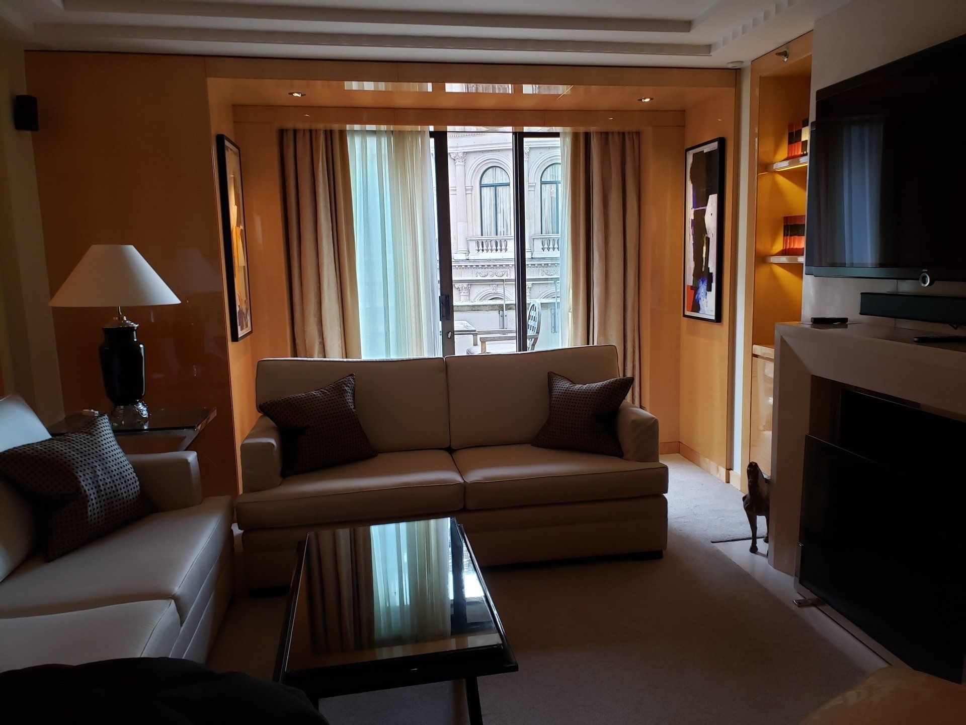 A living room with a couch and a television