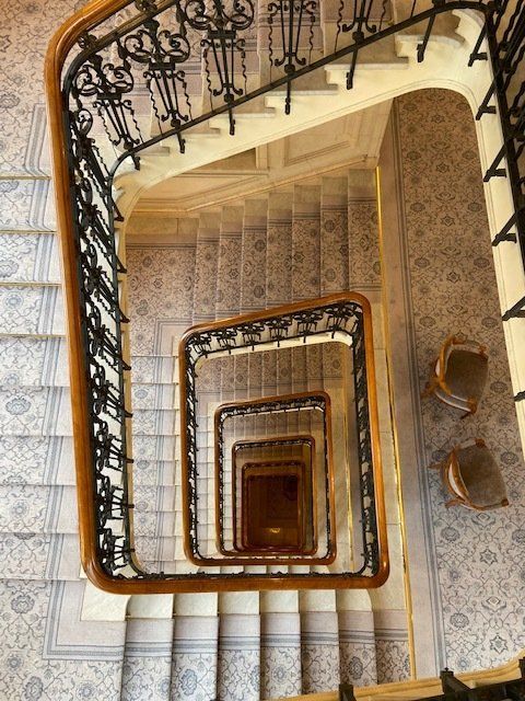 An aerial view of a spiral staircase in a building