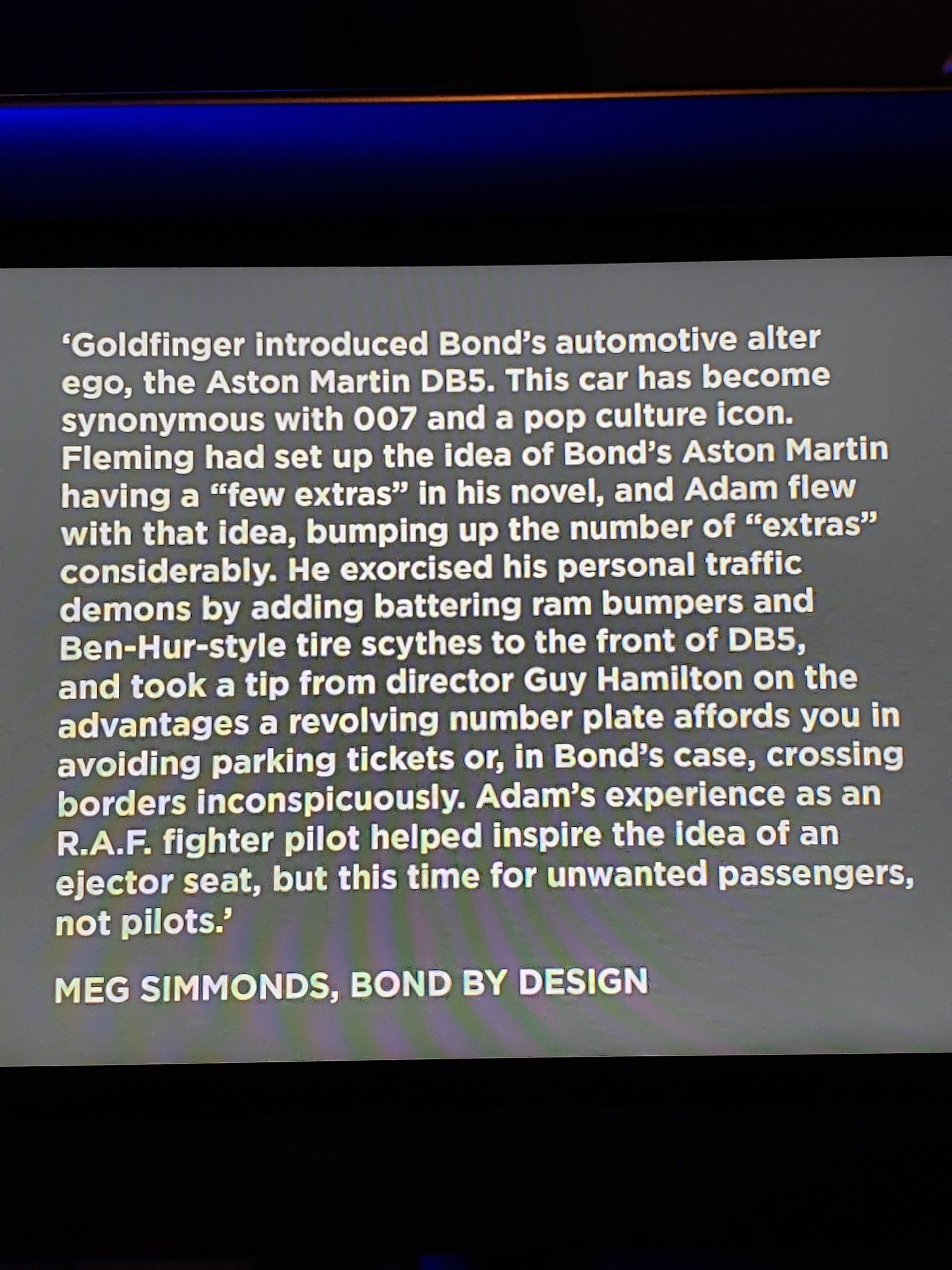 A black screen with white text that says meg simonds bond by design