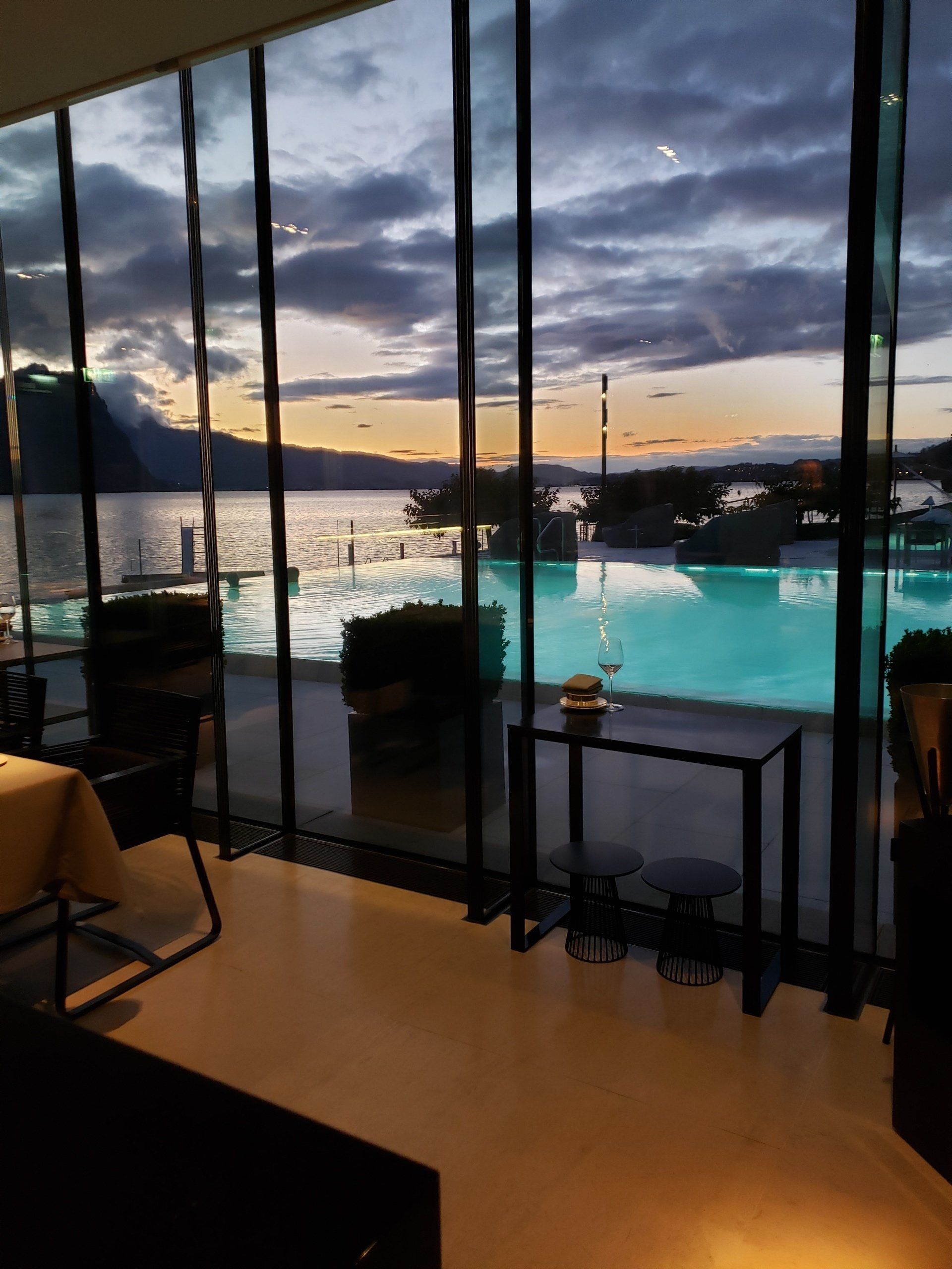 A view of a swimming pool through a large window