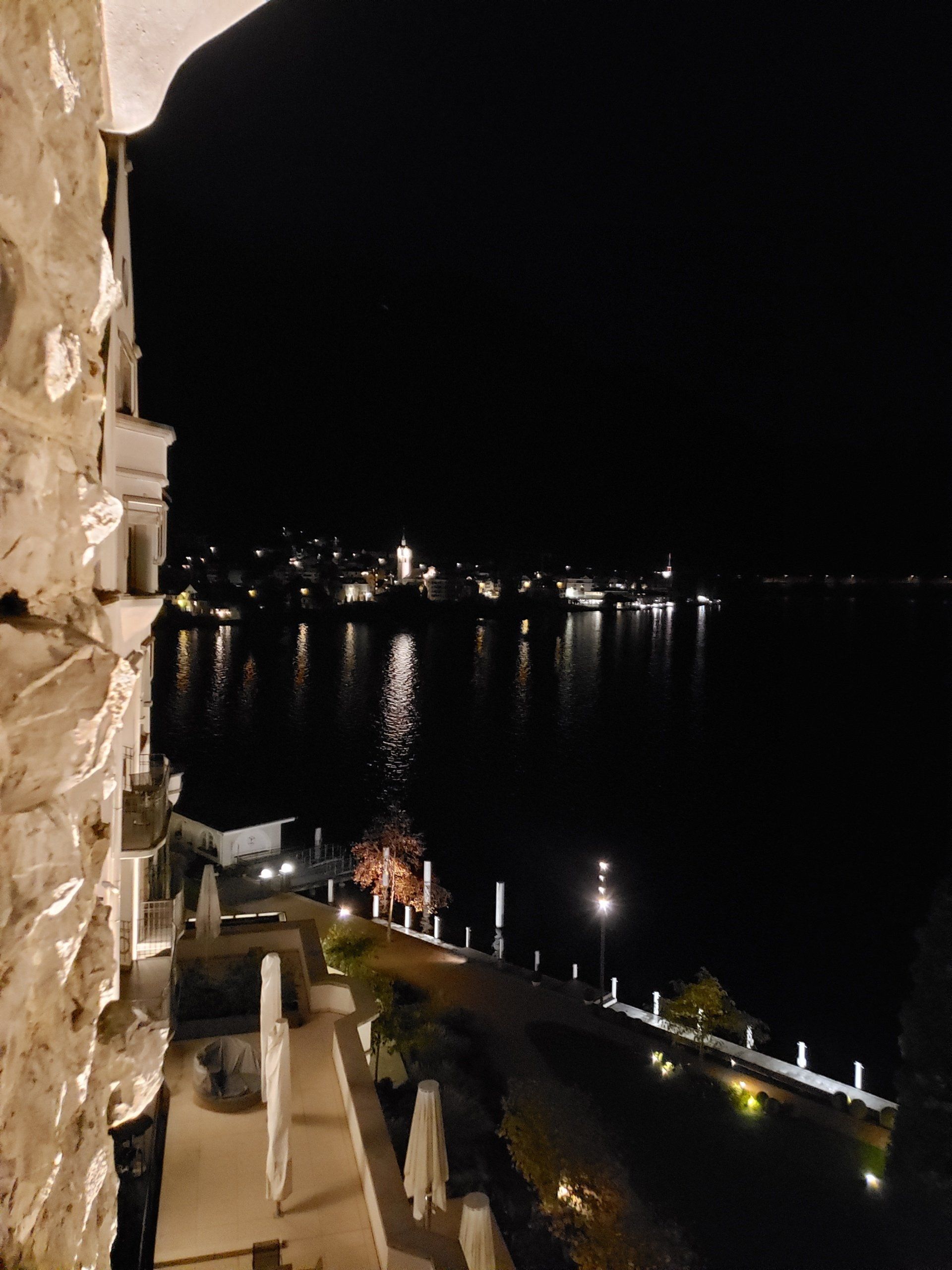 An aerial view of a body of water at night