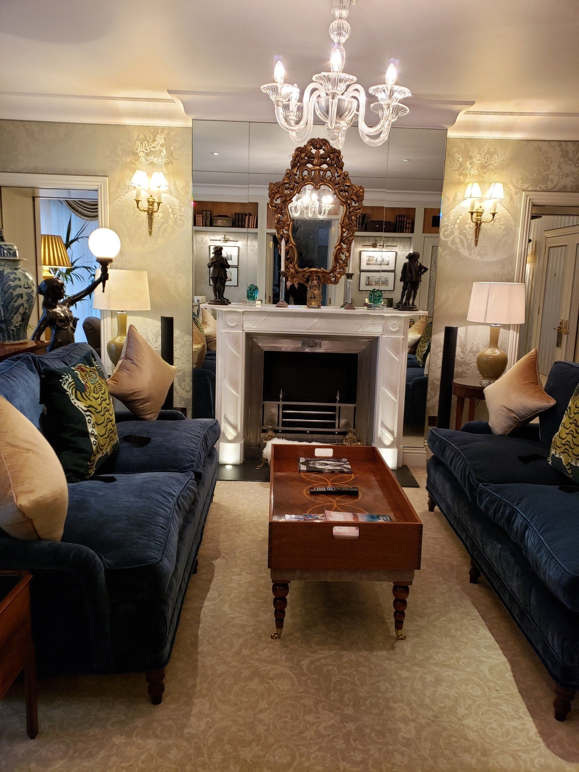 A living room filled with furniture and a fireplace
