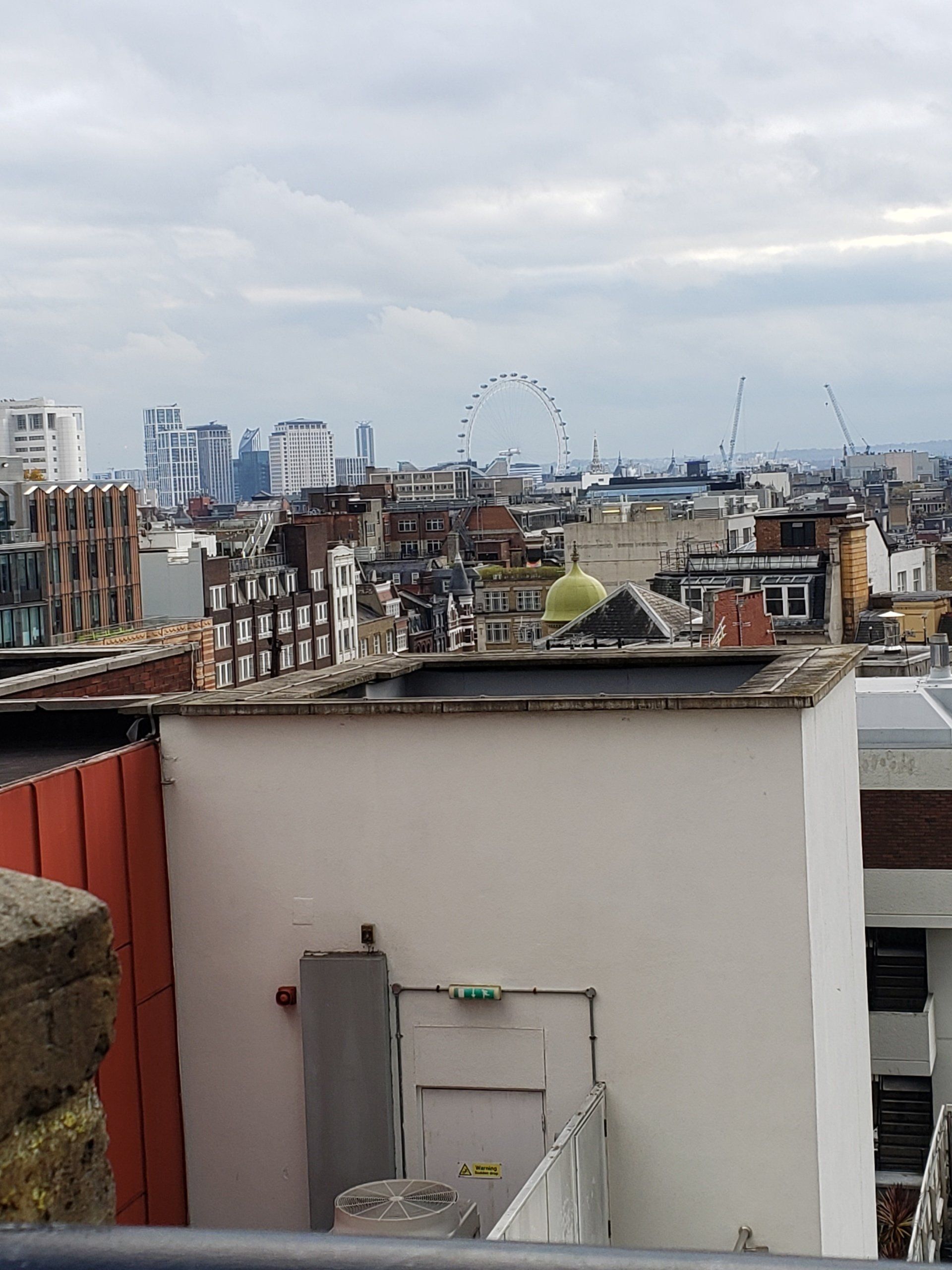 A view of a city from the roof of a building