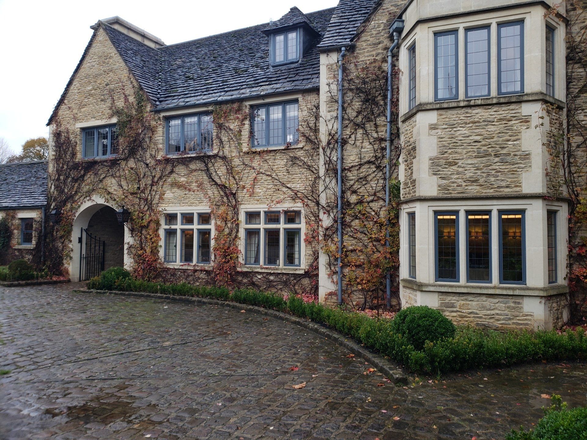 A large stone building with a lot of windows