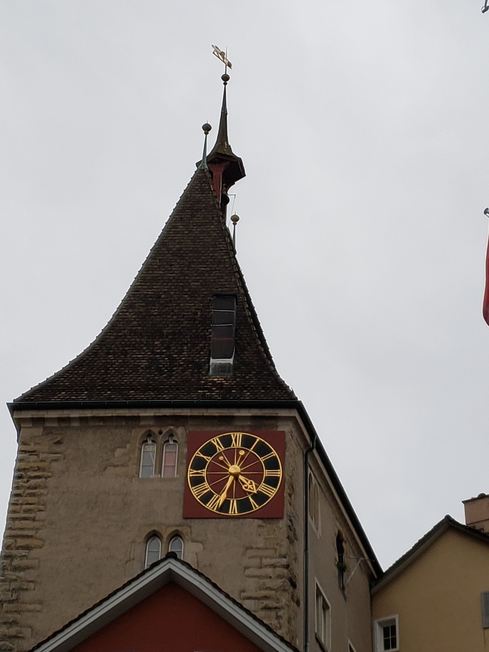 A building with a clock on the top of it