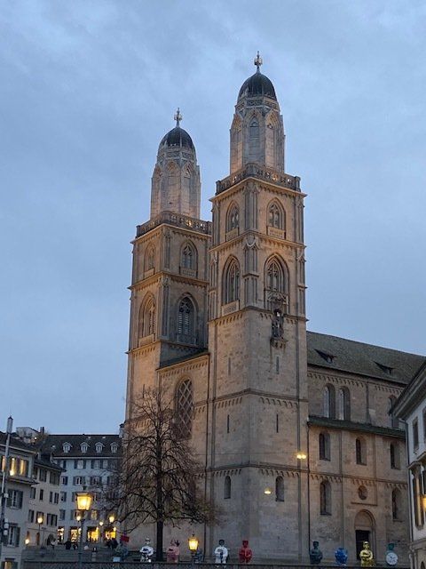A very tall building with a dome on top of it