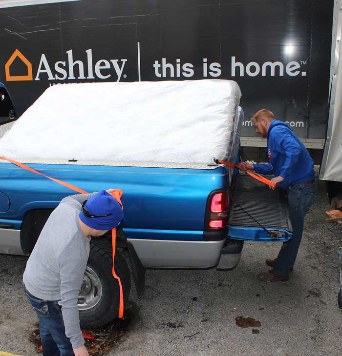 Strapping down the free mattress