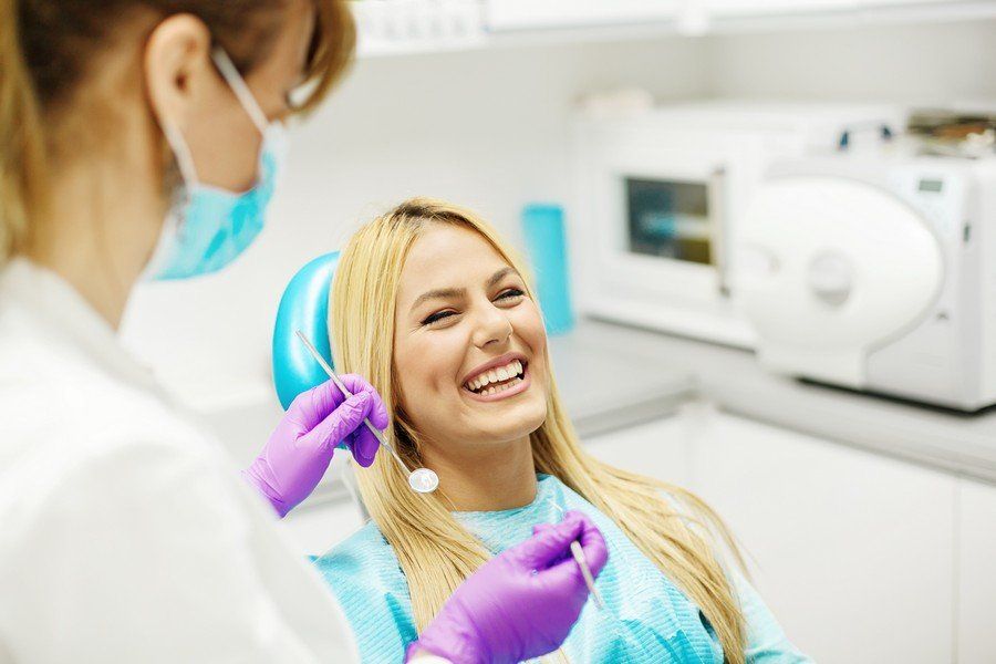 Pediatric Dentist — Female Dentist And Young Woman Patient in Pittsburgh, PA Pediatric Dentist — Female Dentist And Young Woman Patient in Pittsburgh, PA