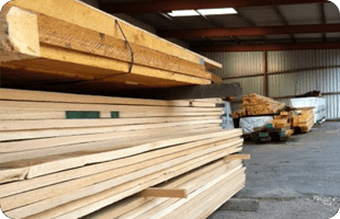 timber beams stacked up on pallet