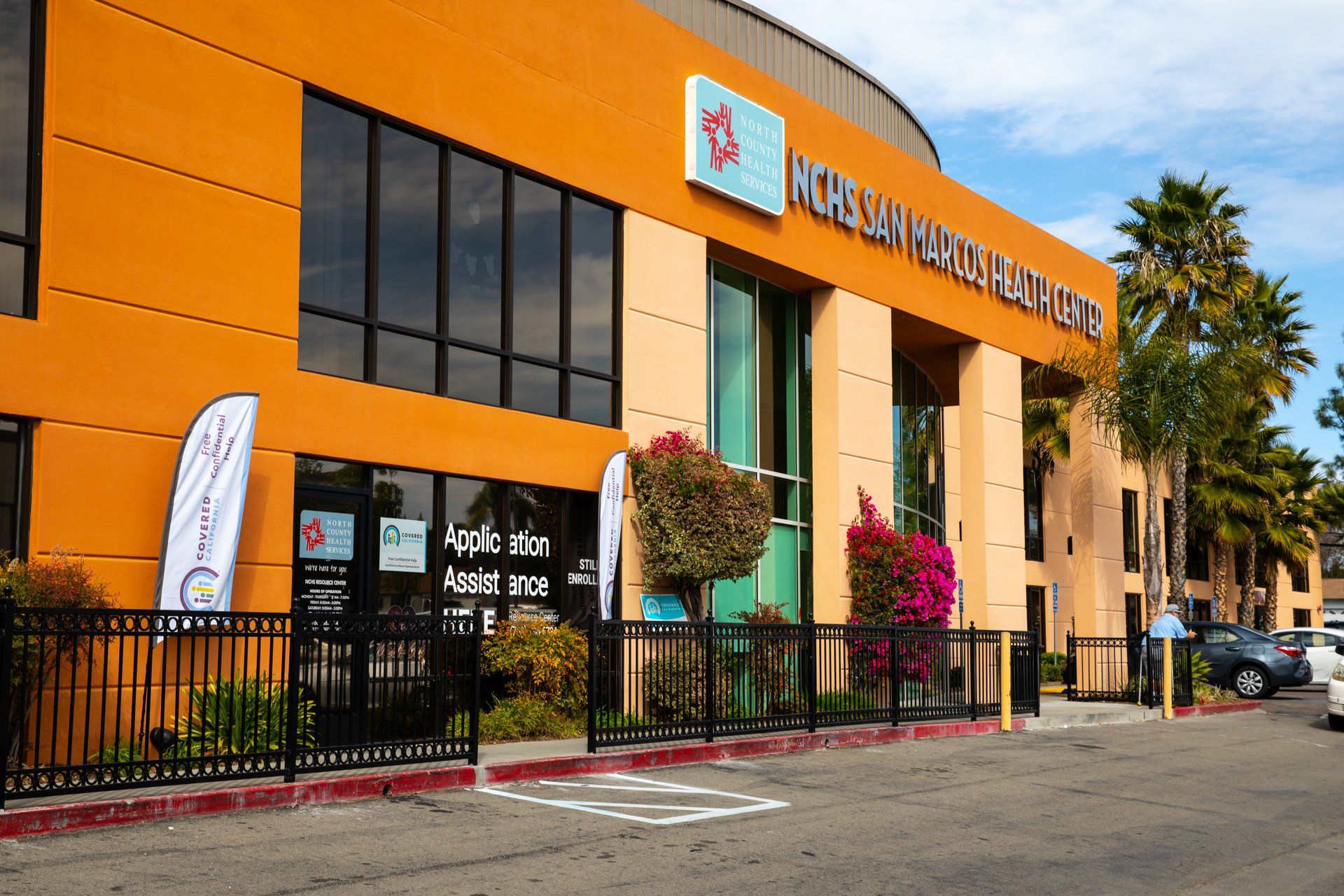 A large orange building with a sign on the side that says jackson health center