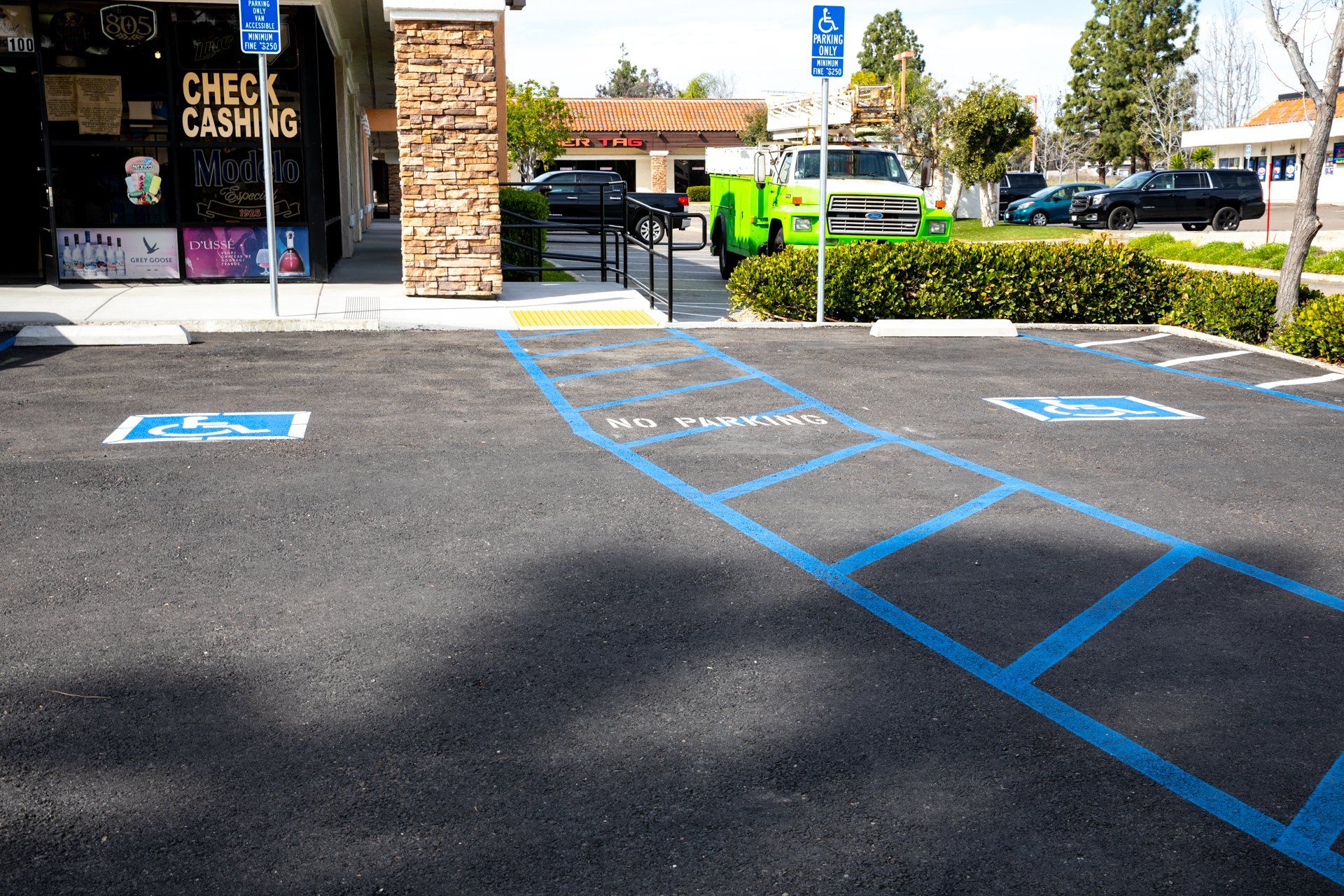 A parking lot in front of a check cashing store