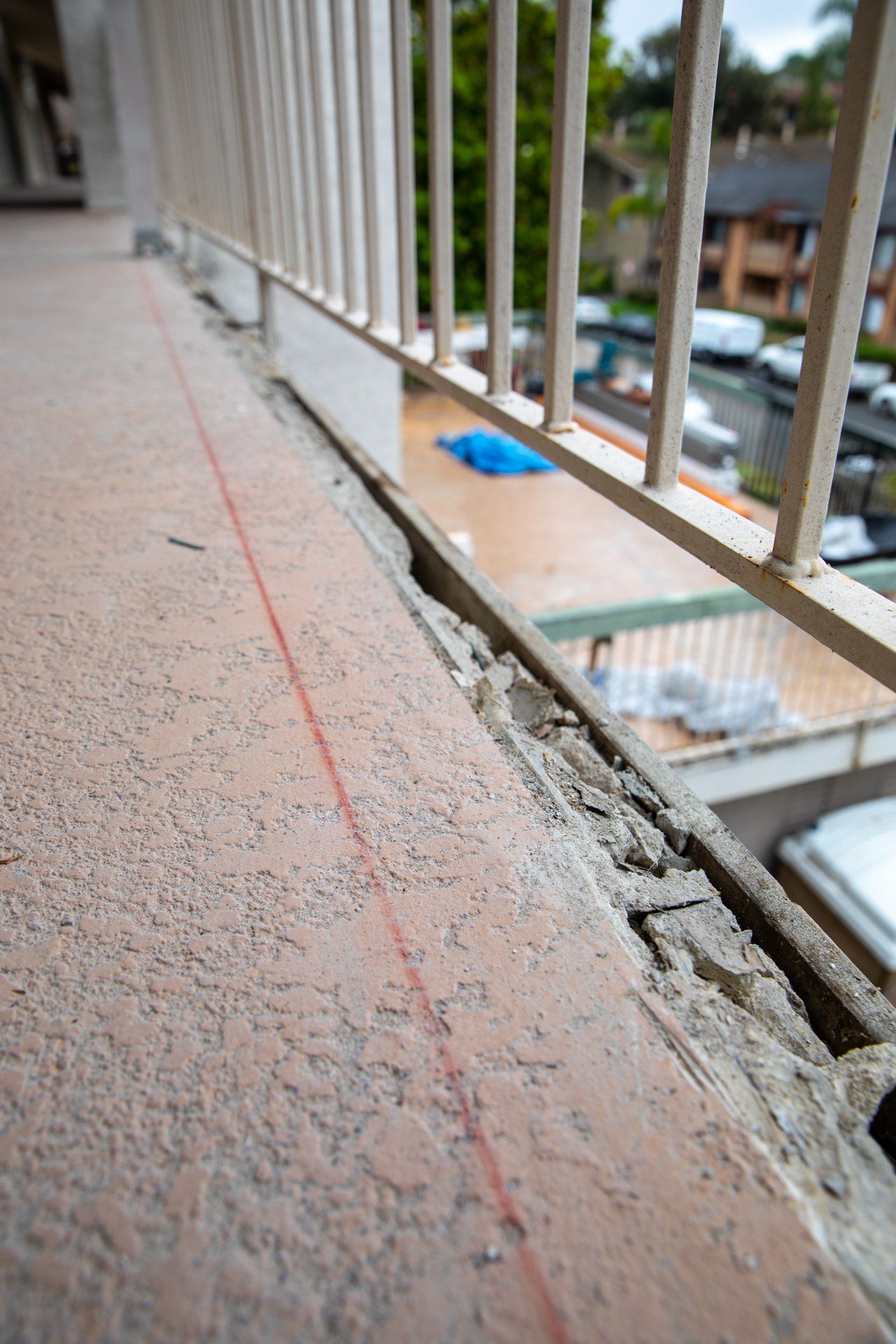 A red line is drawn on the side of a balcony