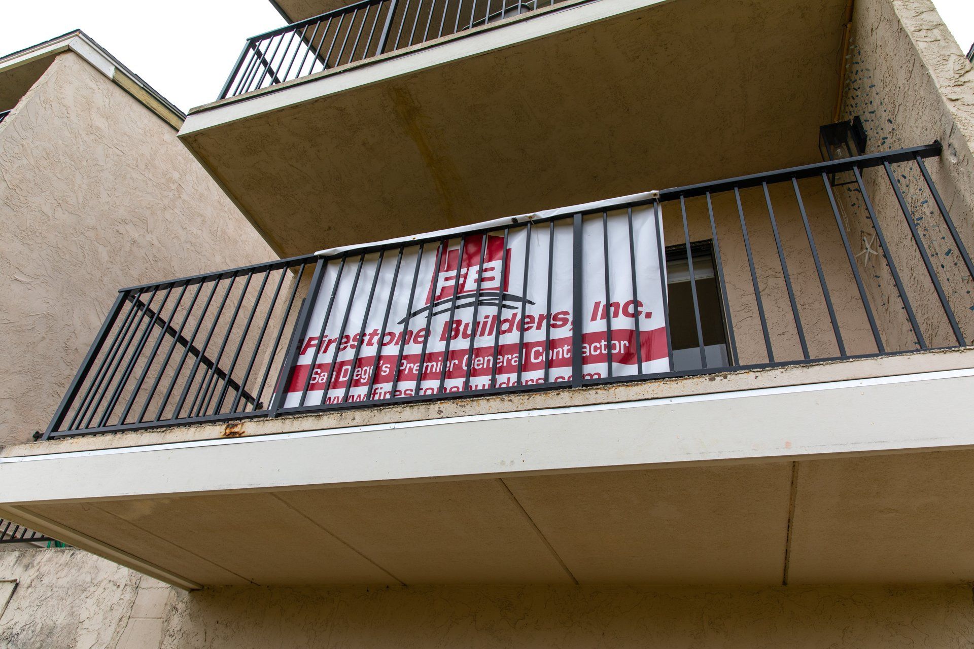 A balcony with a sign on it that says efb