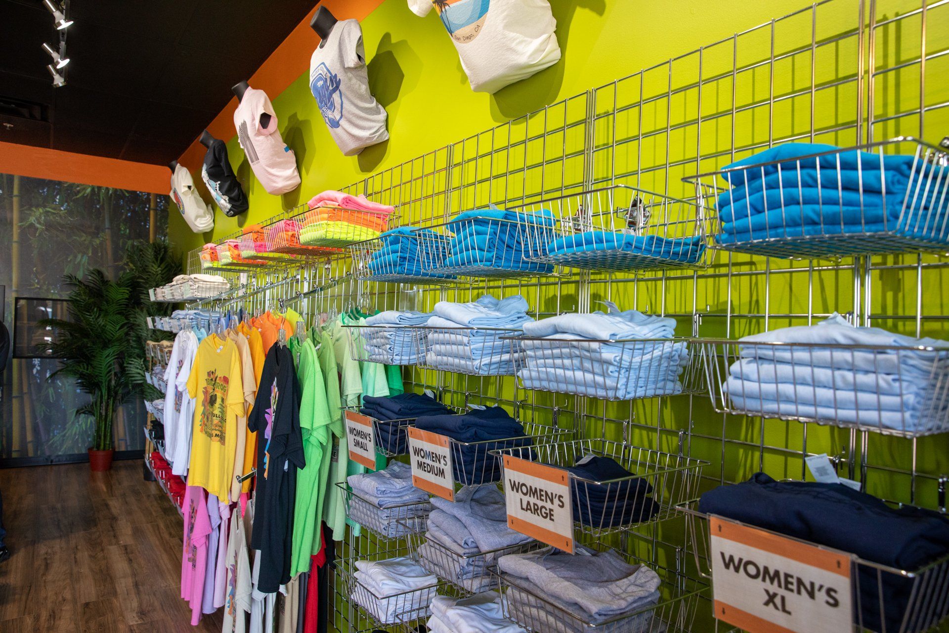 A display of women 's xl shirts in a store