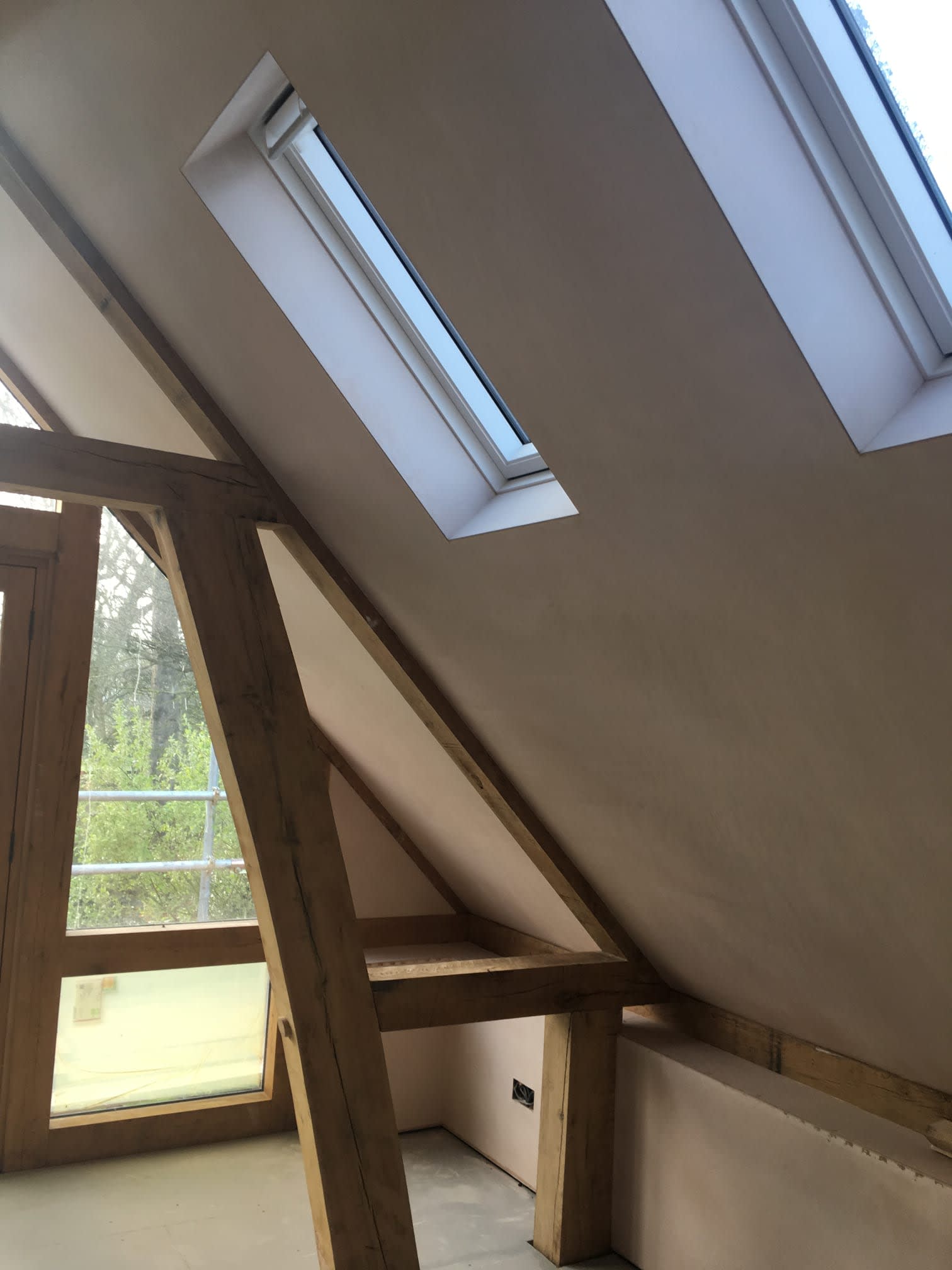 A sloping ceiling with new plaster