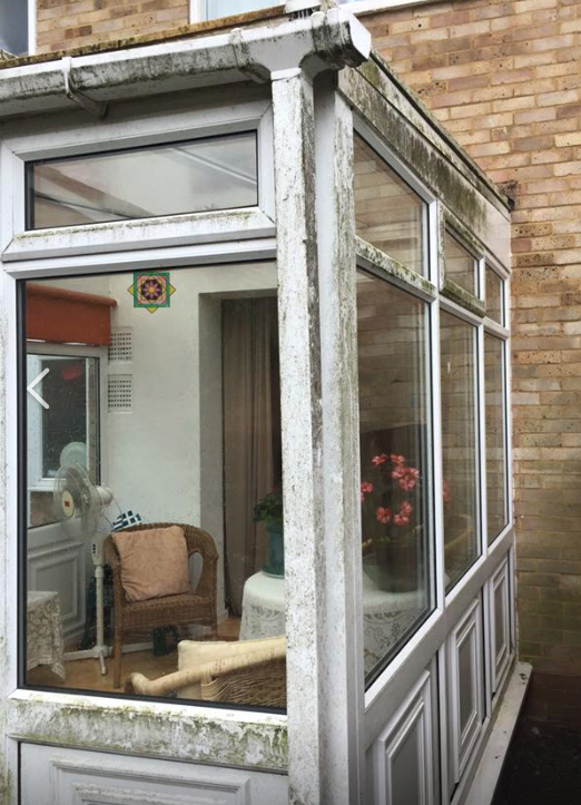 Stained conservatory glass window