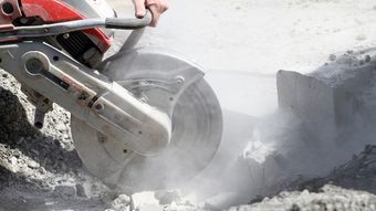 concrete saw cutting concrete blocks