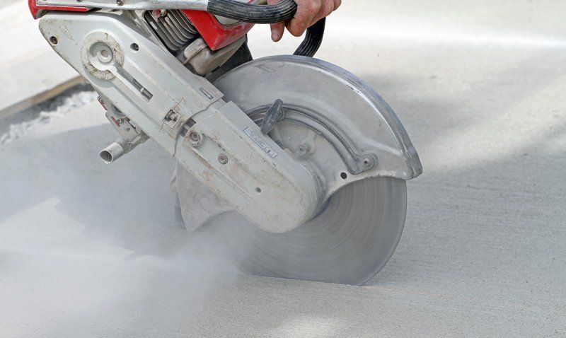concrete saw cutting concrete