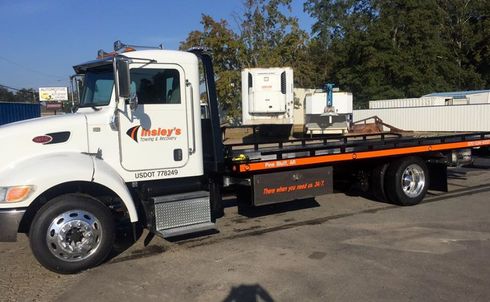 White Flatbed Tow Trucks — Insley’s Towing and Recovery — Pine Bluff, AR White Flatbed Tow Trucks — Insley’s Towing and Recovery — Pine Bluff, AR