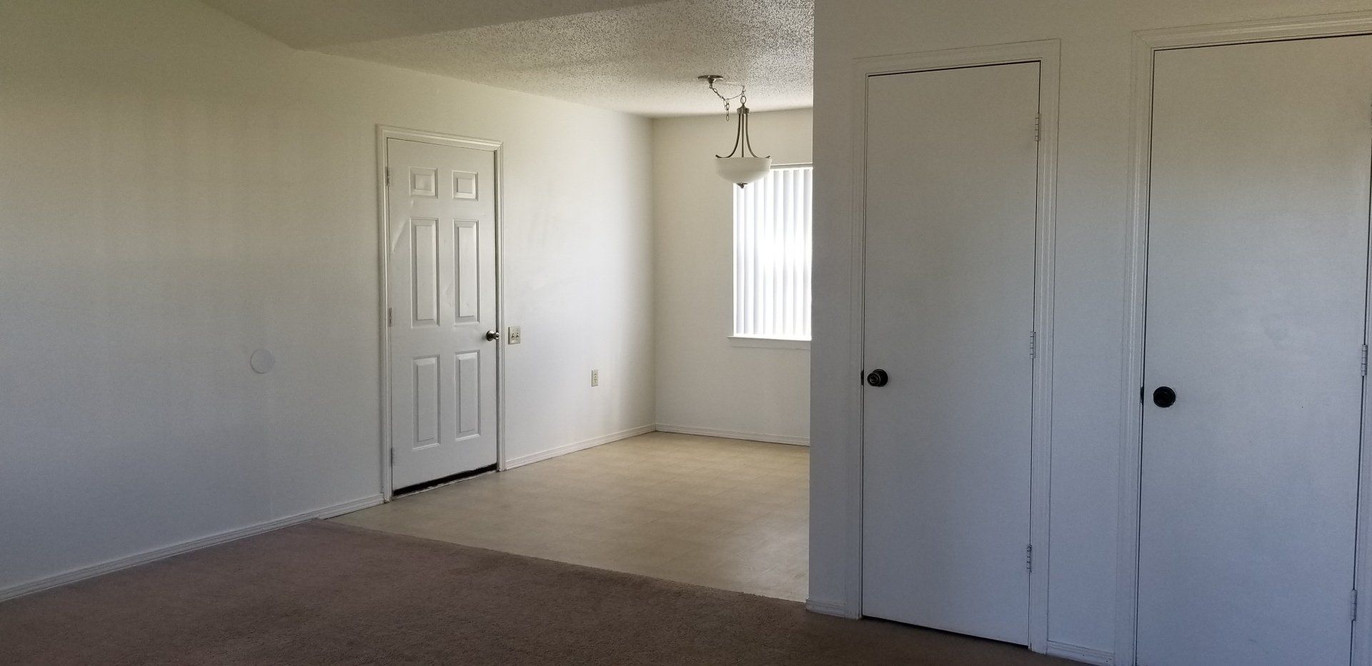 Interior of door with entryway and closet