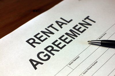 A rental agreement on a desk ready to be signed