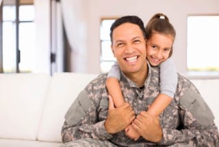 Daughter on her father's back