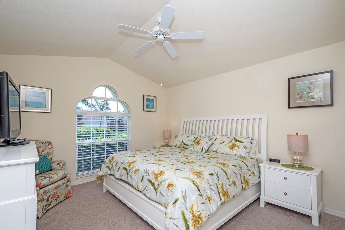 King suite bedroom at Naples Lake View, Briarwood, Florida