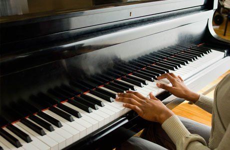 A person playing a piano