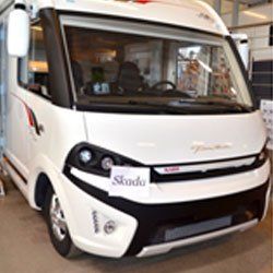 White and black camper van with a
