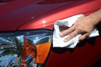 Installing Anti-Blast Film — Collision Repair Specialists in Braintree, Ma Installing Anti-Blast Film — Collision Repair Specialists in Braintree, Ma