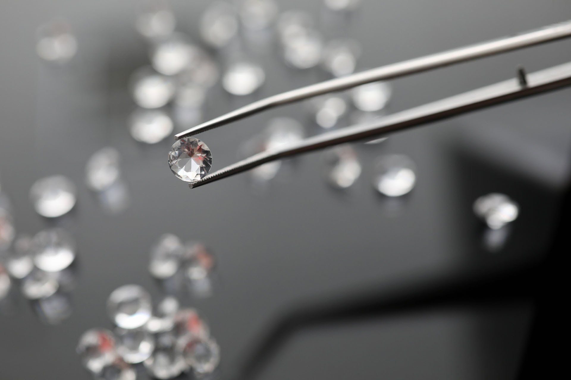 Diamond In Tweezers — Aston, PA — Dyer's Jewelers