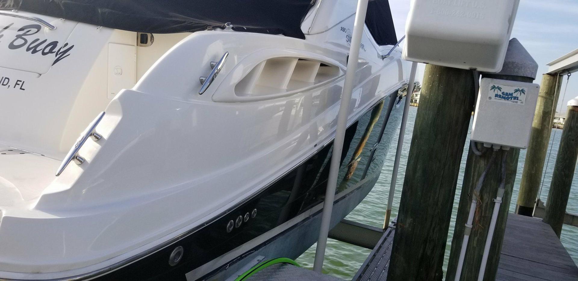 A white and black boat is fully detailed with our Dimond detail.