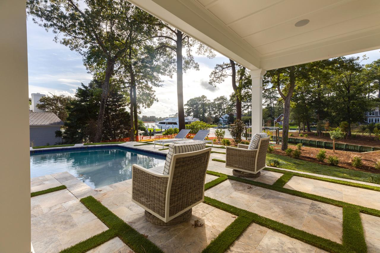 Elegant home rear exterior with view of pool  | Exterior Gallery | Stephen Alexander Homes | Chesapeake, VA