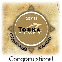 2010 Tonka Times Compass Award badge with “Congratulations!” text on a tan background