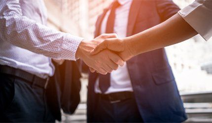 Property Division — Handshake of Business People in Hutchinson, KS Property Division — Handshake of Business People in Hutchinson, KS