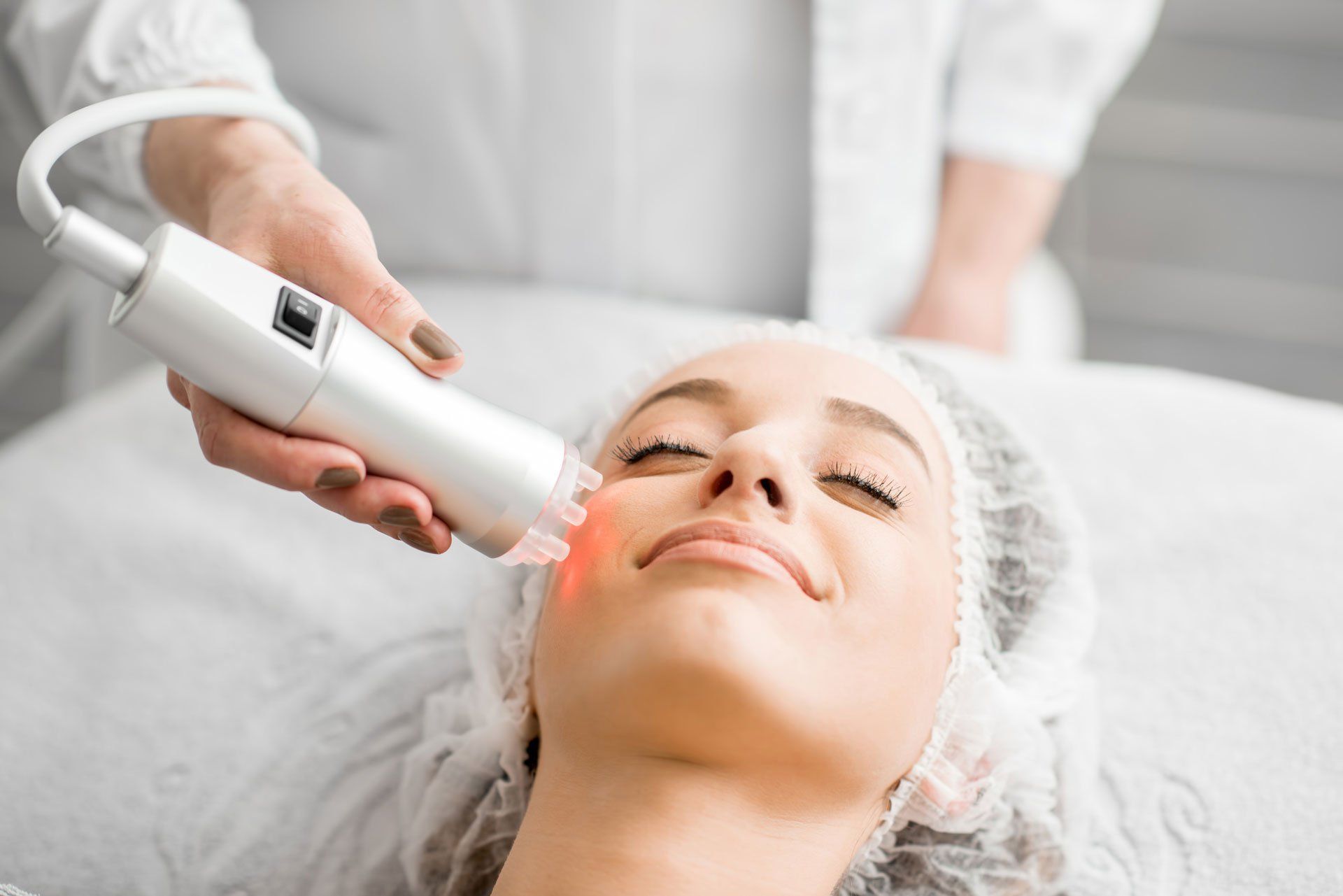 Woman During a Facial Massage — Columbus, OH — Encore Dermatology