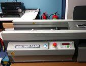 Perfect binding machine Perfect binding machine in Colour Inc print shop