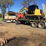 Excavator Loaded On Trailer Truck — K & T Daley in Gracemere, QLD