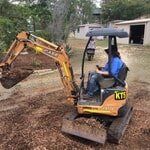 Man Operating Excavator — K & T Daley in Gracemere, QLD
