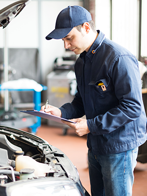 mechanic working on car